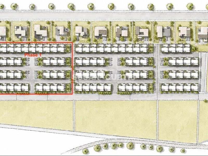 Site plan showing the layout of the townhouse development, including Phase 1 and surrounding residential plots.