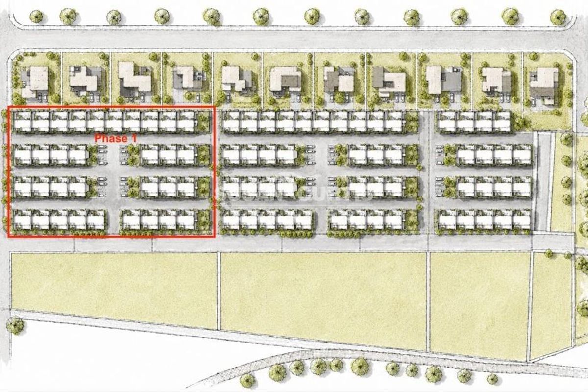 Site plan showing the layout of the townhouse development, including Phase 1 and surrounding residential plots.