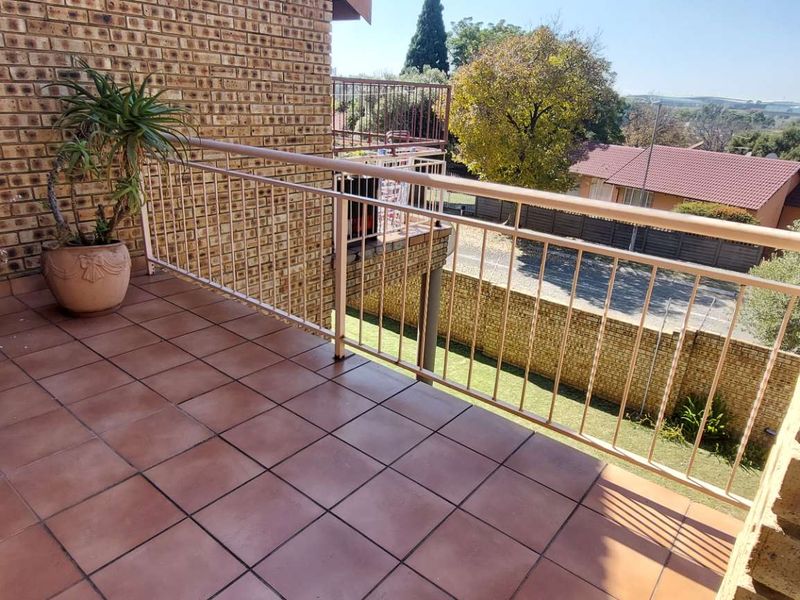 Secure Living: 2 Beds, Balcony, Carport & Storage Galore - Photo 6