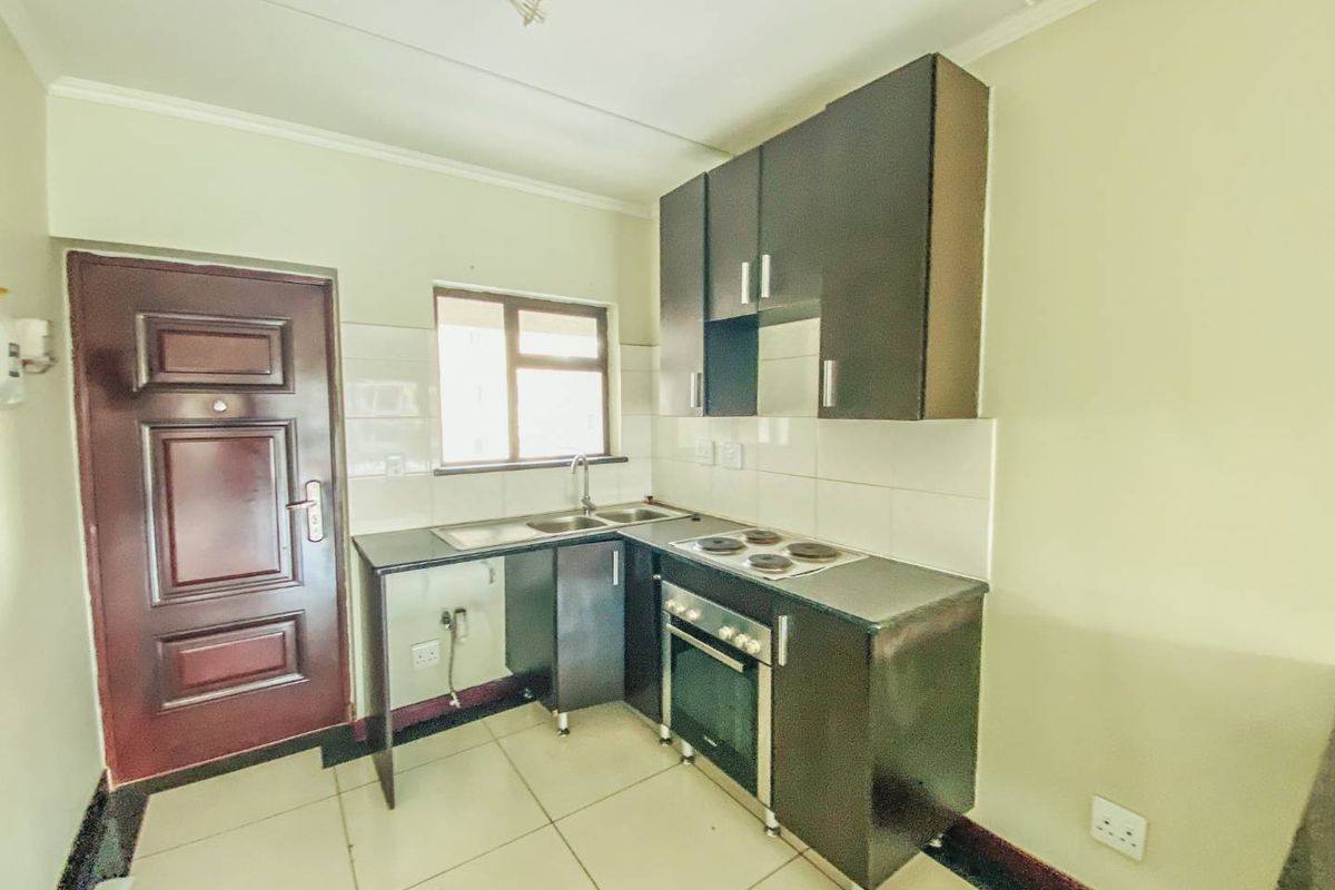 Spacious 2-Bedroom Home with Covered Parking in Secure Estate - Photo 3