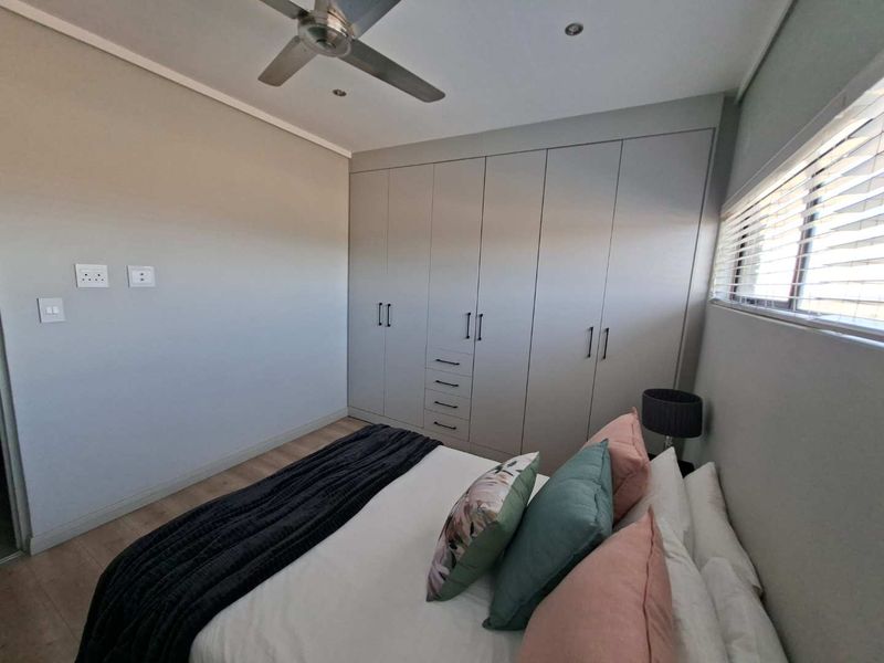 EXCLUSIVE MIDSTREAM ESTATE LIVING – SECURE, SOPHISTICATED & CONVENIENT - Photo 6