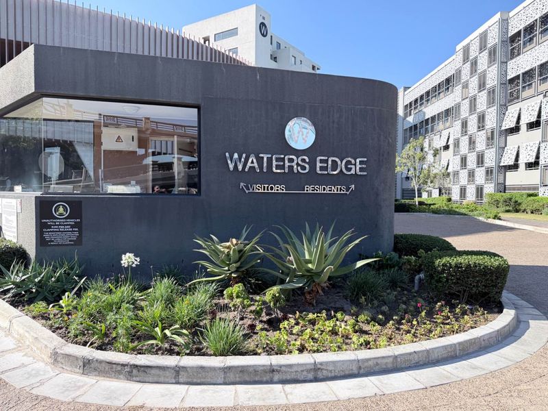 Spacious Apartment In Popular Waters Edge - Photo 1
