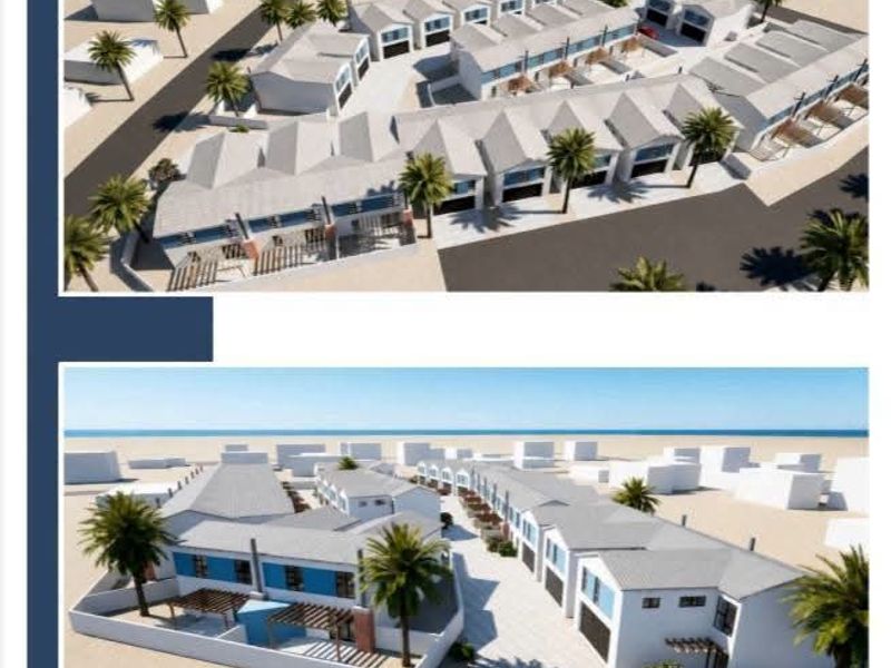 An aerial perspective rendering of the Valora Estate residential development, showcasing the layout of the housing units, driveways, and landscaped outdoor areas.