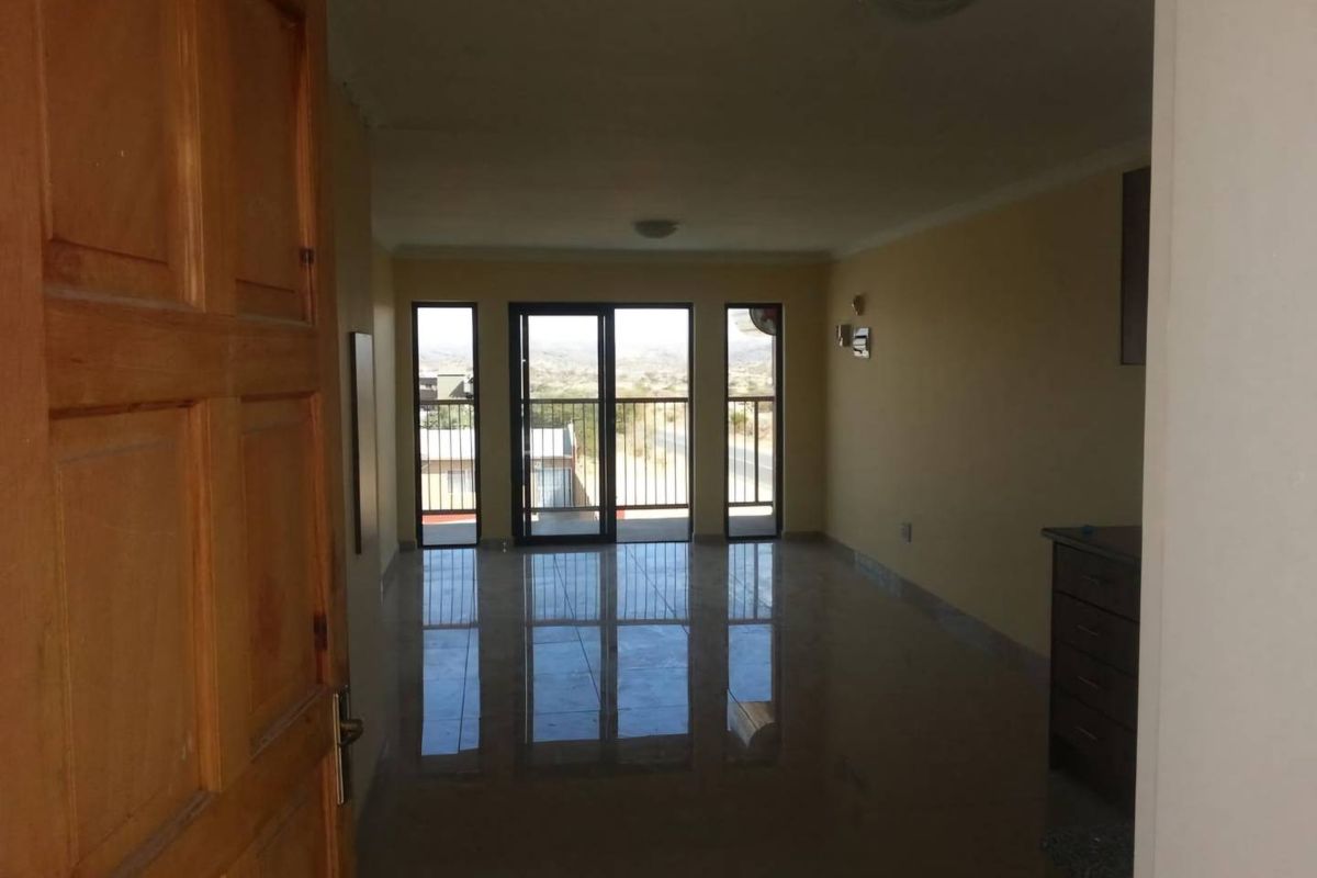 2 BEDROOM APARTMENT FOR SALE IN OTJOMUISE – WINDHOEK Modern, neat and spacious 78 m2 apartment situated on the 3rd floor of a secure complex in Otjomuise. - Photo 2