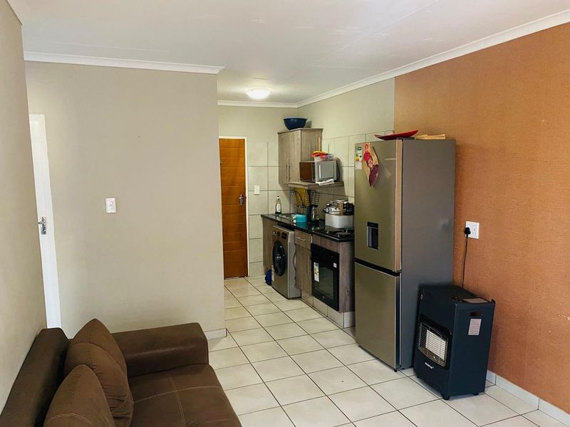 Discover Affordable, Secure and Comfortable living in Elandspoort!!! - Photo 5