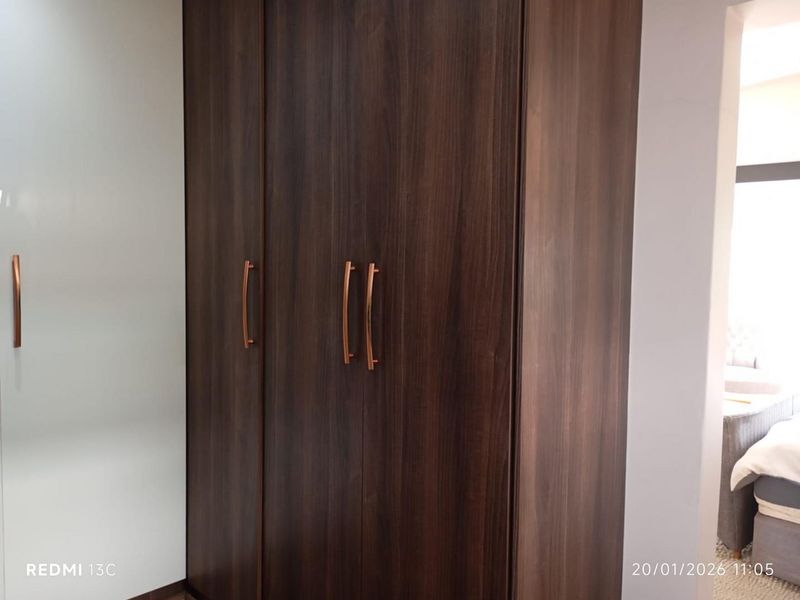 Elegant Family Living in Secure Glen Eagle Estate - Photo 8