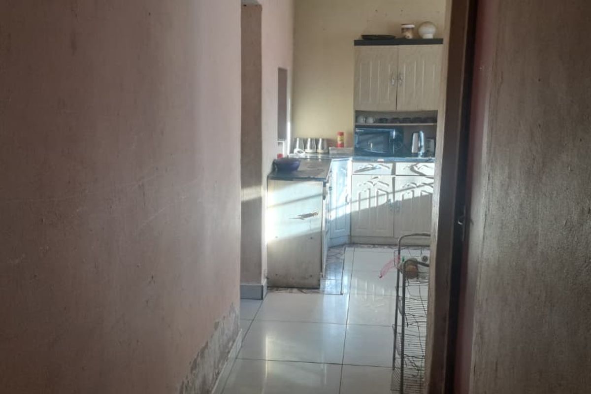 Peaceful 3-Bedroom Family Home with 2 Rondavels for Extra Income Potential - Photo 3
