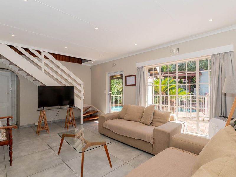 Stylish 4-Bedroom off-grid Family Home in Secure Van Riebeeck Park Enclosure - Photo 4
