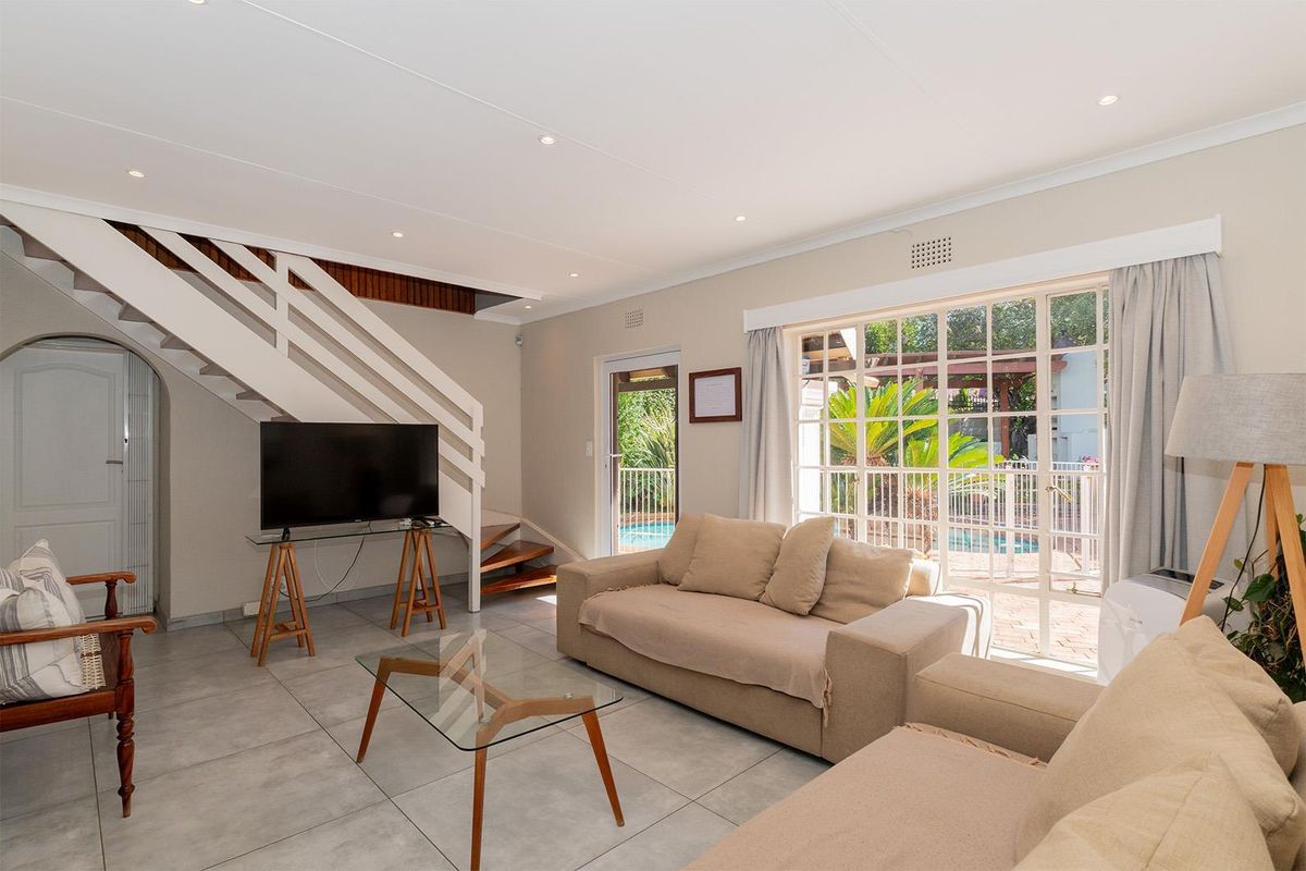 Stylish 4-Bedroom off-grid Family Home in Secure Van Riebeeck Park Enclosure - Photo 4