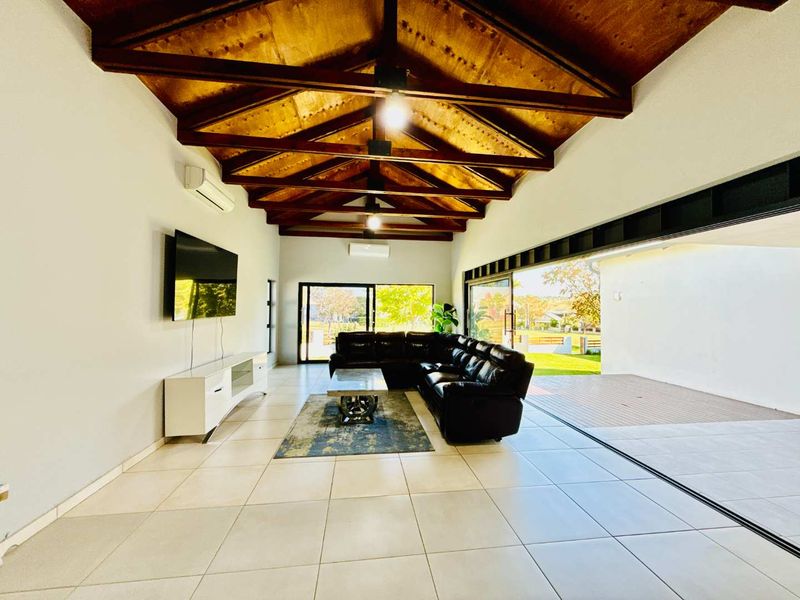 Modern Single Level Family Home on the Green Belt in Copperleaf Golf Estate - Photo 4