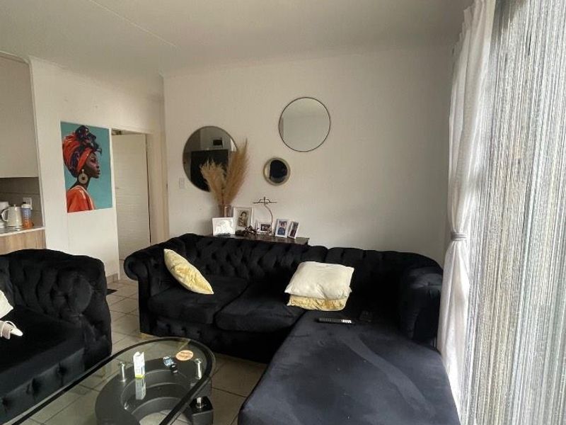 Bright & Airy 4-Bedroom Unit with Secure Access Control - Photo 7