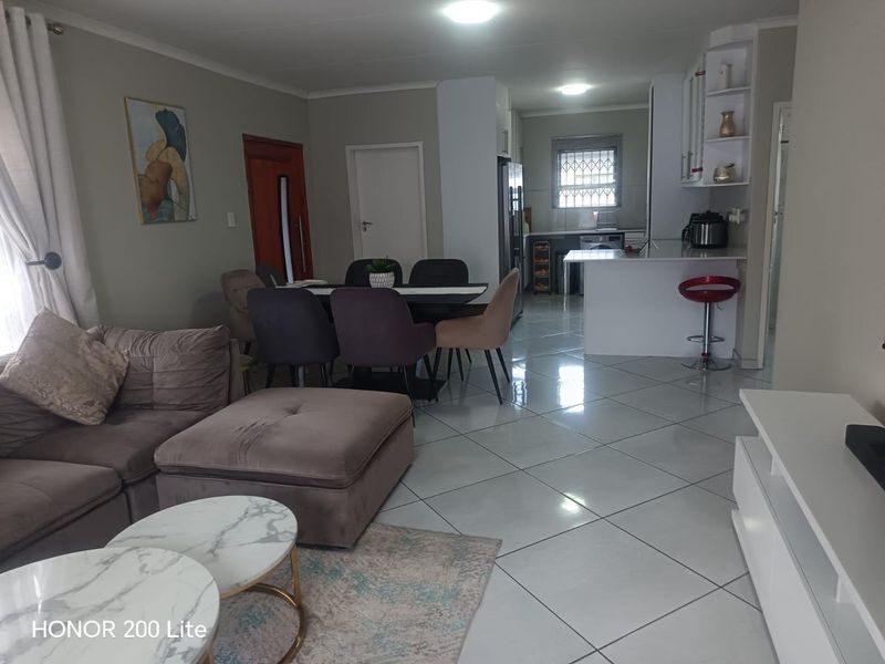 1. "Discover Your Dream Home in Mackenzie Palms!" 2. "Luxurious Living Awaits in This 3-Bedroom Gem!" 3. "Modern Comfort Meets Security in Mackenzie Palms!" 4. - Photo 5