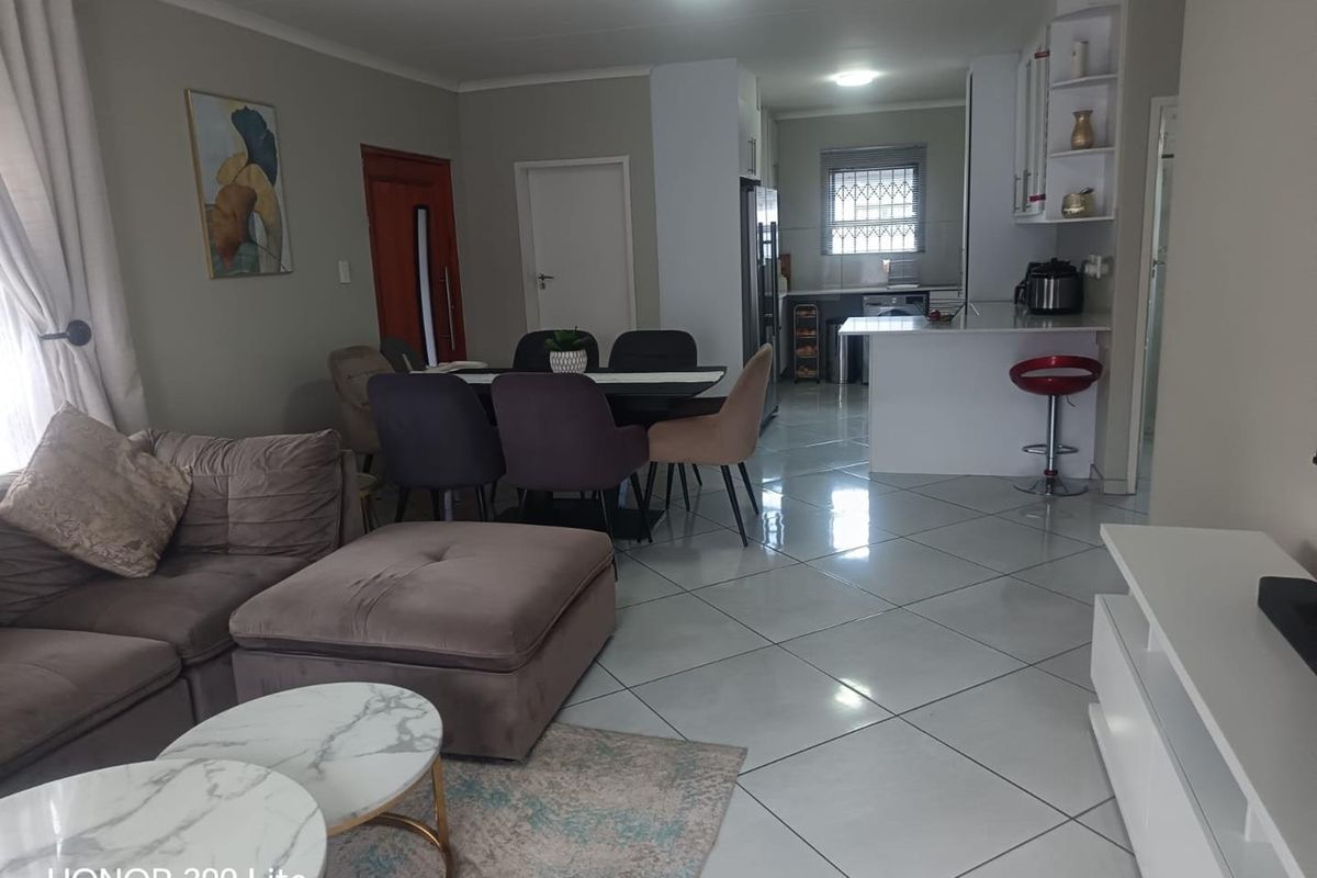 1. "Discover Your Dream Home in Mackenzie Palms!" 2. "Luxurious Living Awaits in This 3-Bedroom Gem!" 3. "Modern Comfort Meets Security in Mackenzie Palms!" 4. - Photo 5