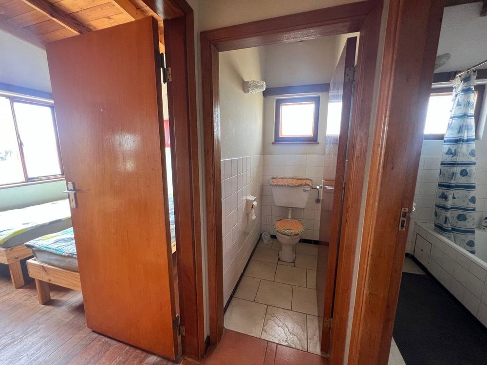 Left- bedroom 3, Middle- WC, Right- bathroom
