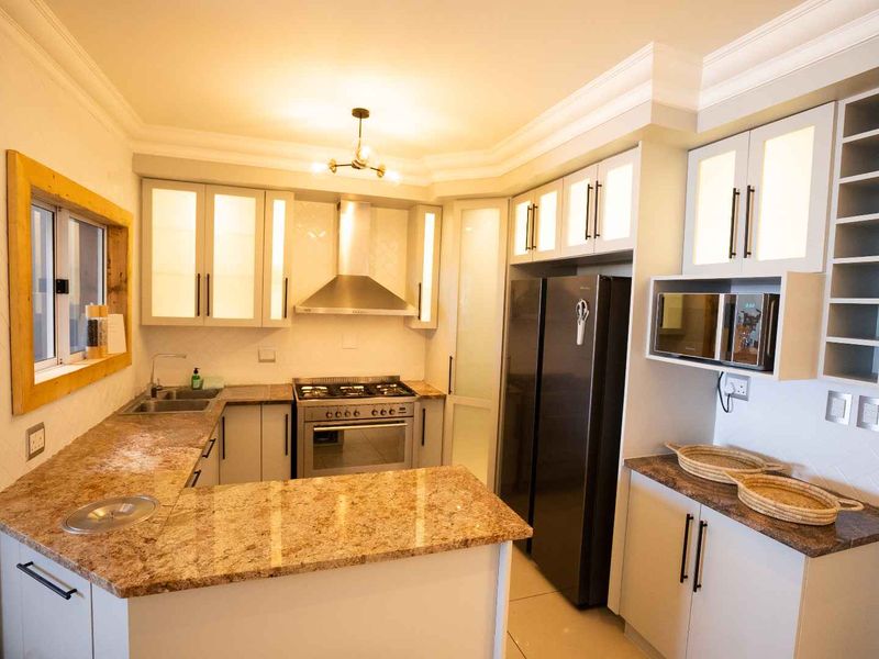 Beachfront Investment Opportunity – Fully Furnished & Airbnb-Ready - Photo 6