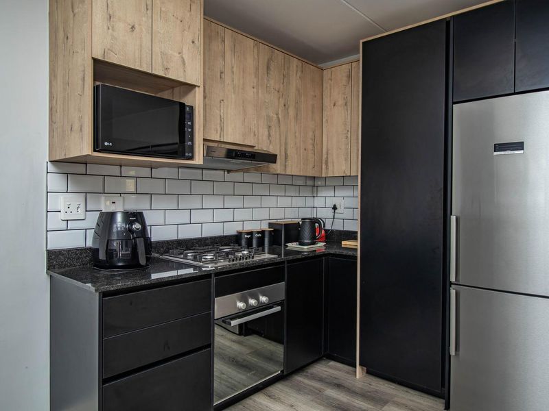 Charming Ground Floor Unit at Hartland Villas - Photo 4