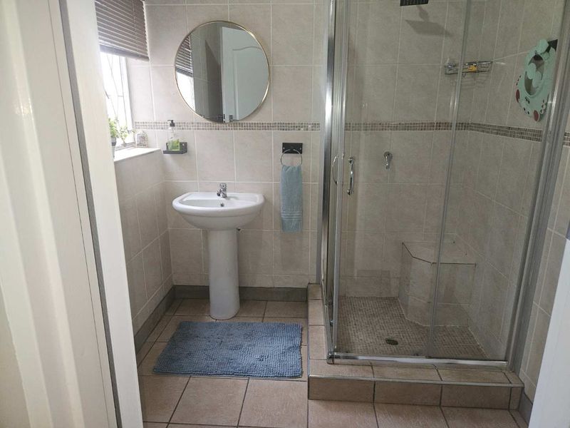 Charming Face-Brick Family Home with Modern Amenities and Exceptional Security - Photo 9