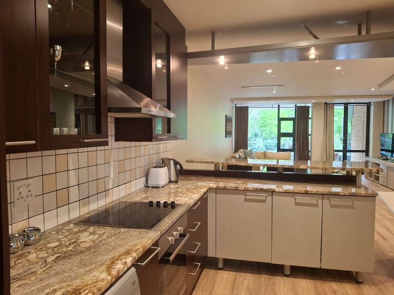 A TASTEFULLY FURNISHED TWO BEDROOM APARTMENT - Photo 8