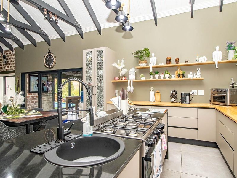 An entertainer's paradise nestled on a sprawling stand, offering a lifestyle that seamlessly blends comfort and luxury. - Photo 4