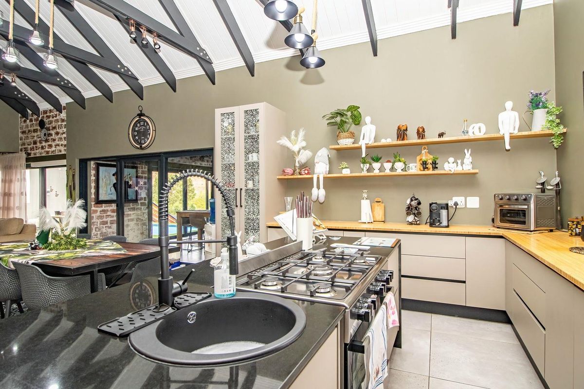 An entertainer's paradise nestled on a sprawling stand, offering a lifestyle that seamlessly blends comfort and luxury. - Photo 4