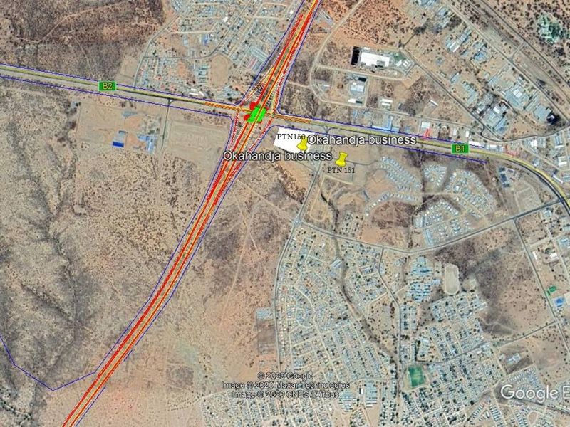 Aerial satellite view showing the commercial land parcel location in relation to major highway infrastructure and surrounding urban development.