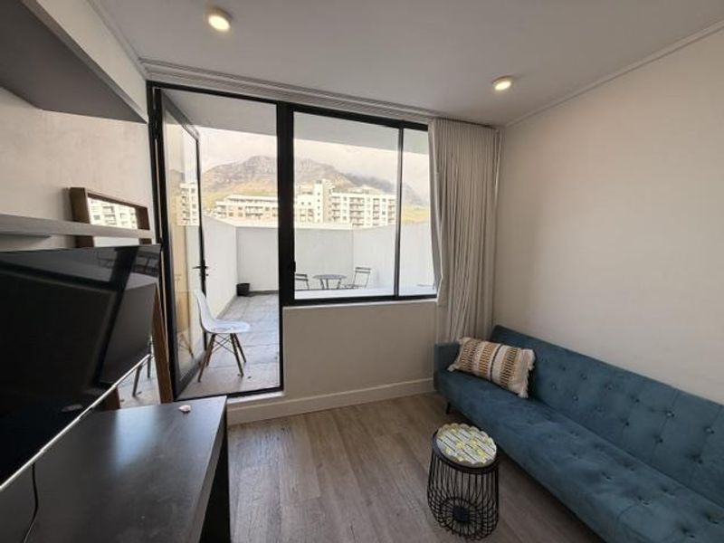 Furnished STUDIO apartment with large balcony, parking & great mountain views - Photo 8