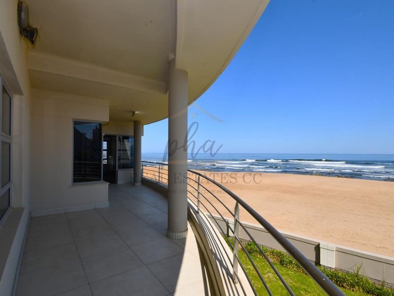 Exceptional Double-Story Beachfront Home with Unobstructed Sea Views - Photo 3