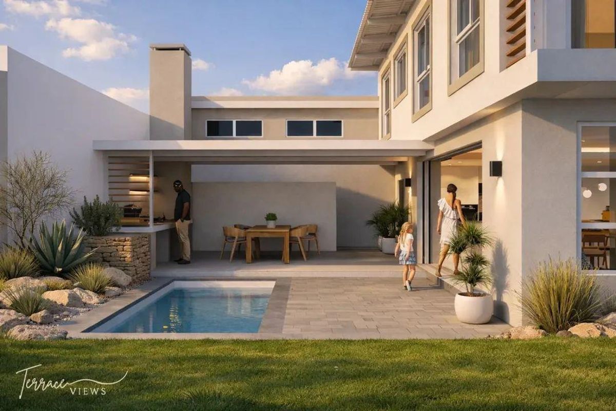 A modern outdoor entertainment area featuring a covered patio with a built-in braai, a swimming pool, and seamless indoor-outdoor flow.