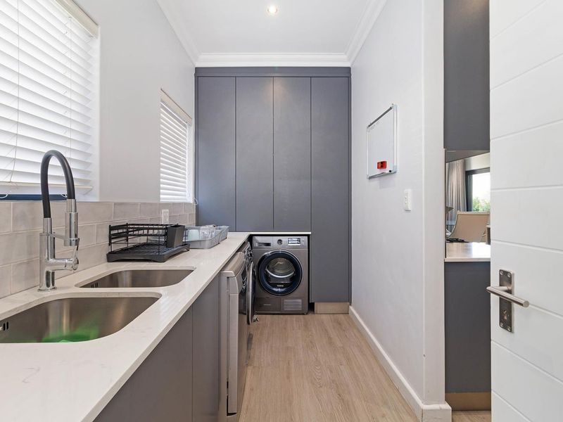 Spacious Family Living in Prestigious Sagewood Security Estate - Photo 9