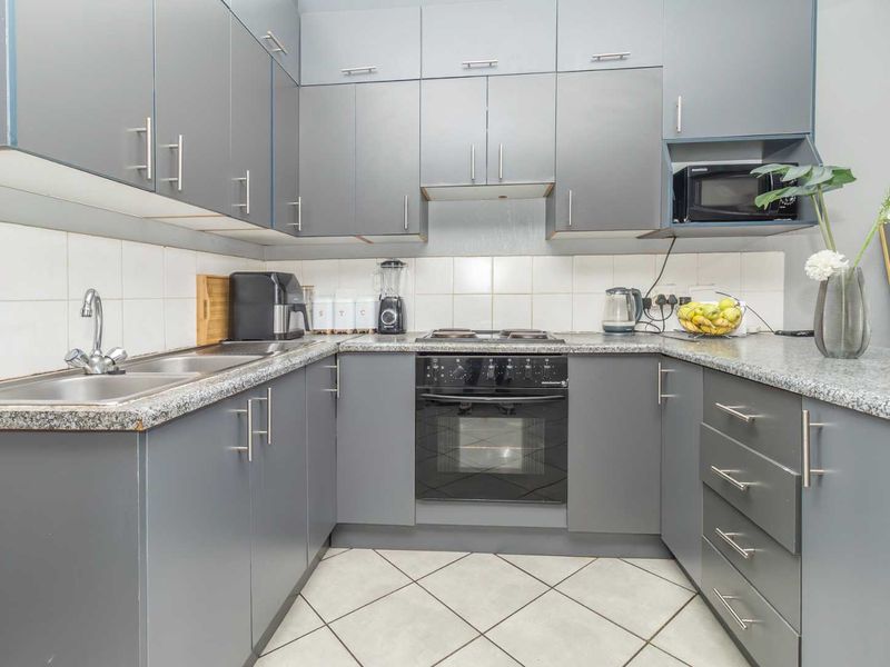 Serenity, Security, and Style in One Perfect Package. Pet-Friendly Oasis with Private Garden Awaits - Photo 6