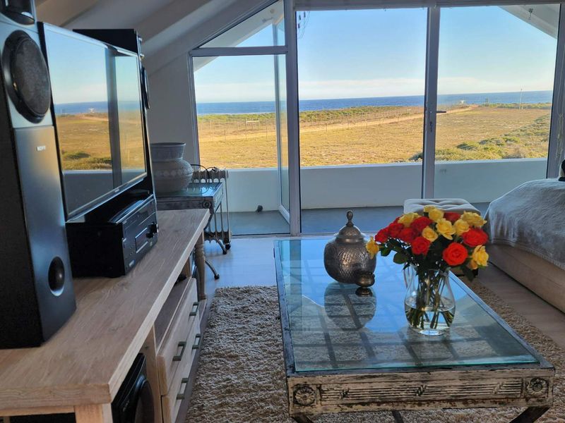 Modern Spacious Living at the Beach with Sea Views - Photo 6