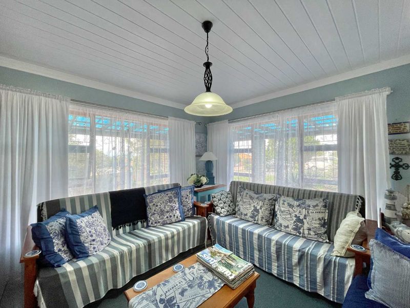 Prestigious Hartenbos Heuwels Home | 4 Bedrooms | Green Belt Views & Exceptional Privacy - Photo 4