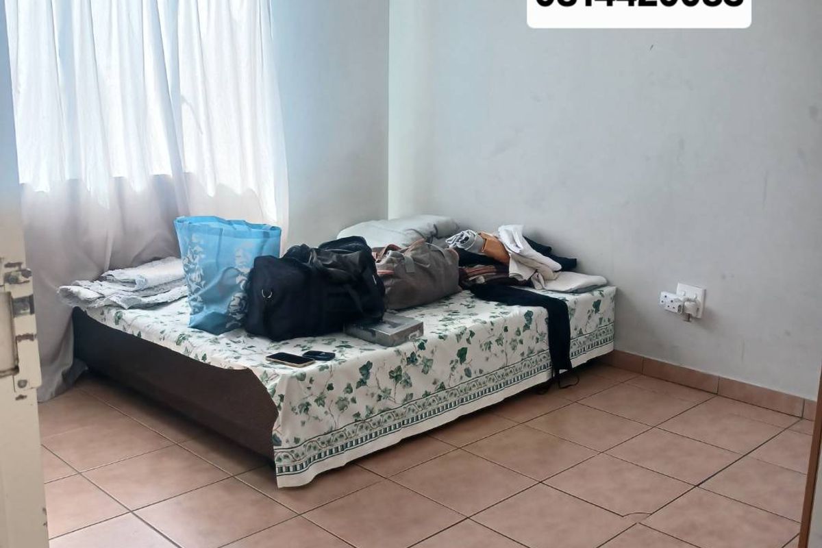 A bedroom featuring tiled flooring and a window with curtain tracks.