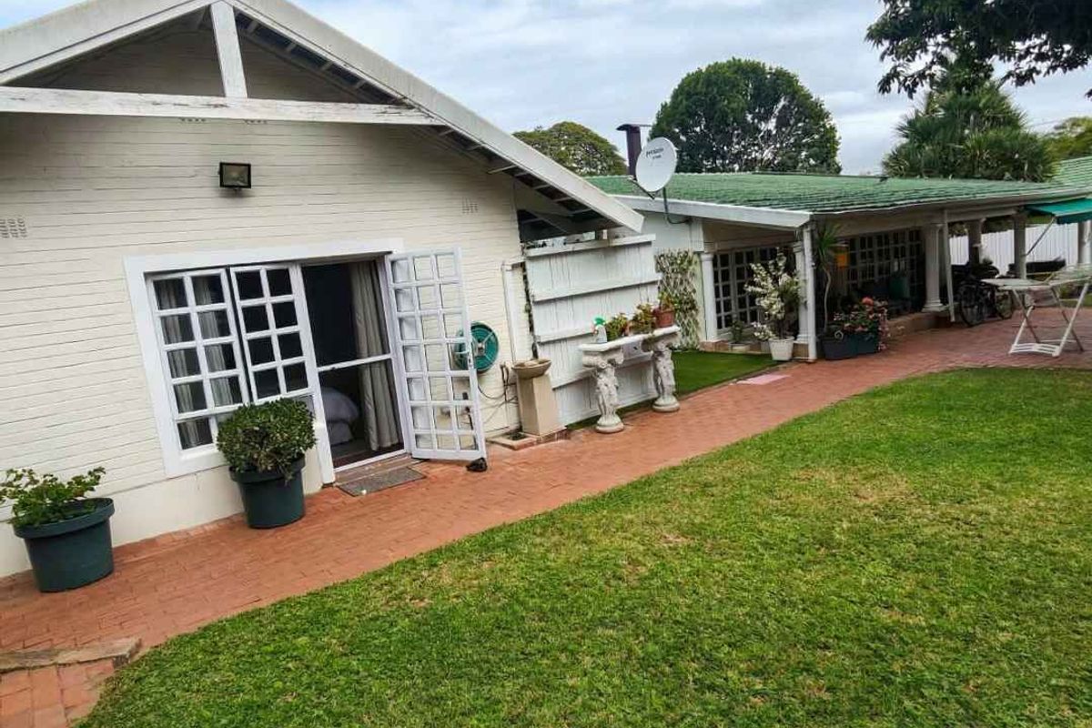 Elegant Estate Home Set on Expansive Grounds with Future Potential - Photo 3