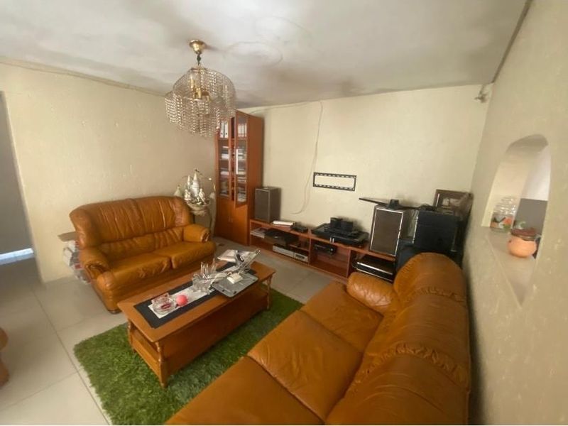 Complete This 2-Bed Home & Profit from 6-Room Rentals Now! - Photo 4