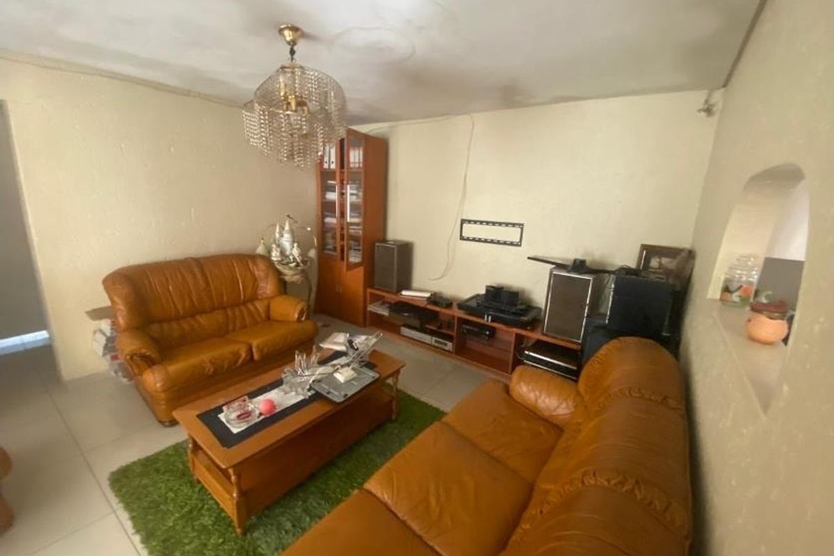 Complete This 2-Bed Home & Profit from 6-Room Rentals Now! - Photo 4