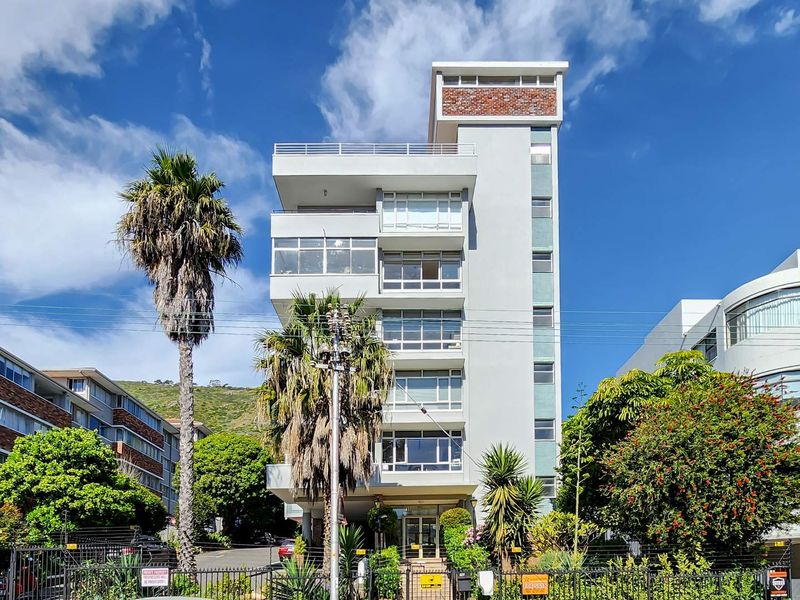 North east facing corner apartment with two balconies and automated garage | Sea Point - Photo 1
