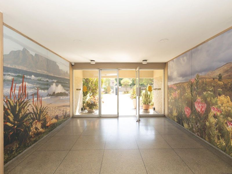 Spacious living with scenic views in a secure setting. - Photo 3