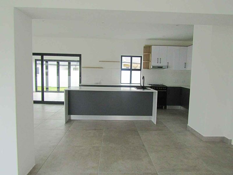 Costal three bedroom home with modern finishes - Photo 4