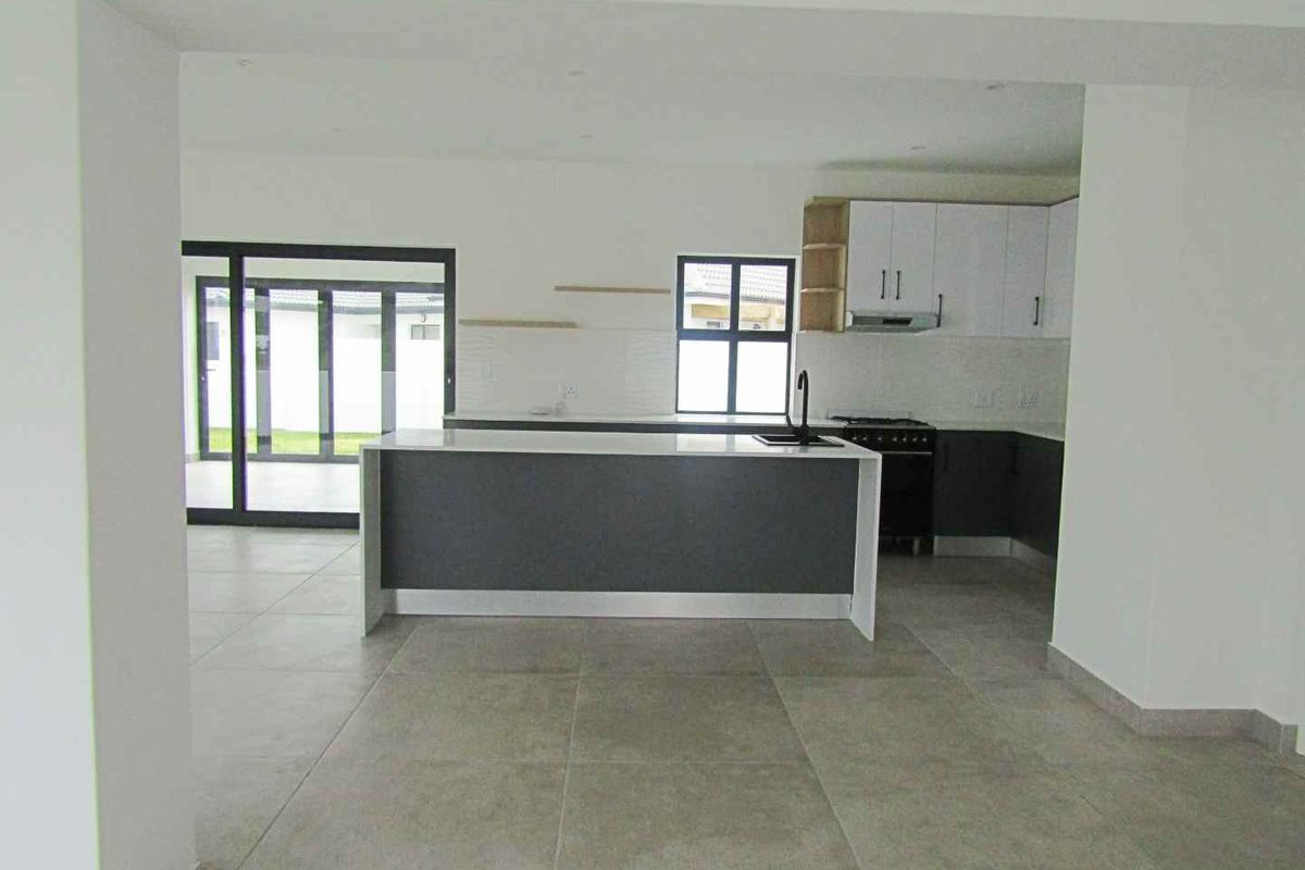 Costal three bedroom home with modern finishes - Photo 4