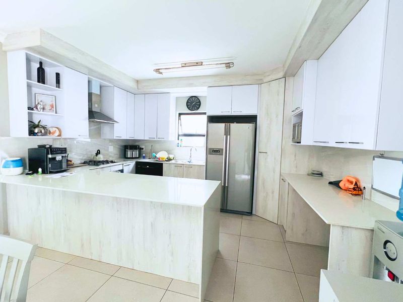 Modern Double-Storey Home in Prestigious Security Estate - Photo 4