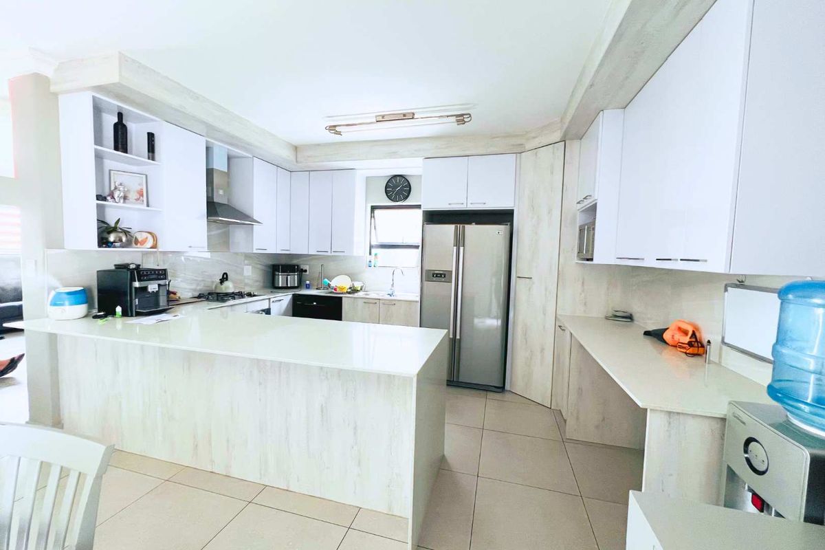 Modern Double-Storey Home in Prestigious Security Estate - Photo 4