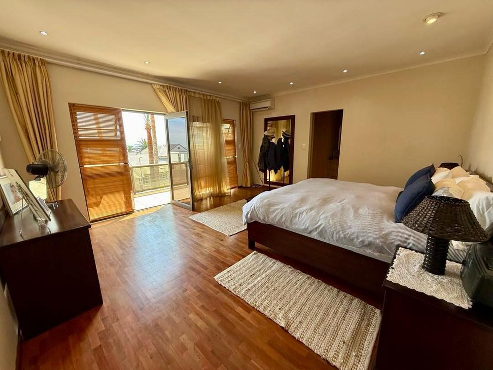 Main bedroom with a private balcony 