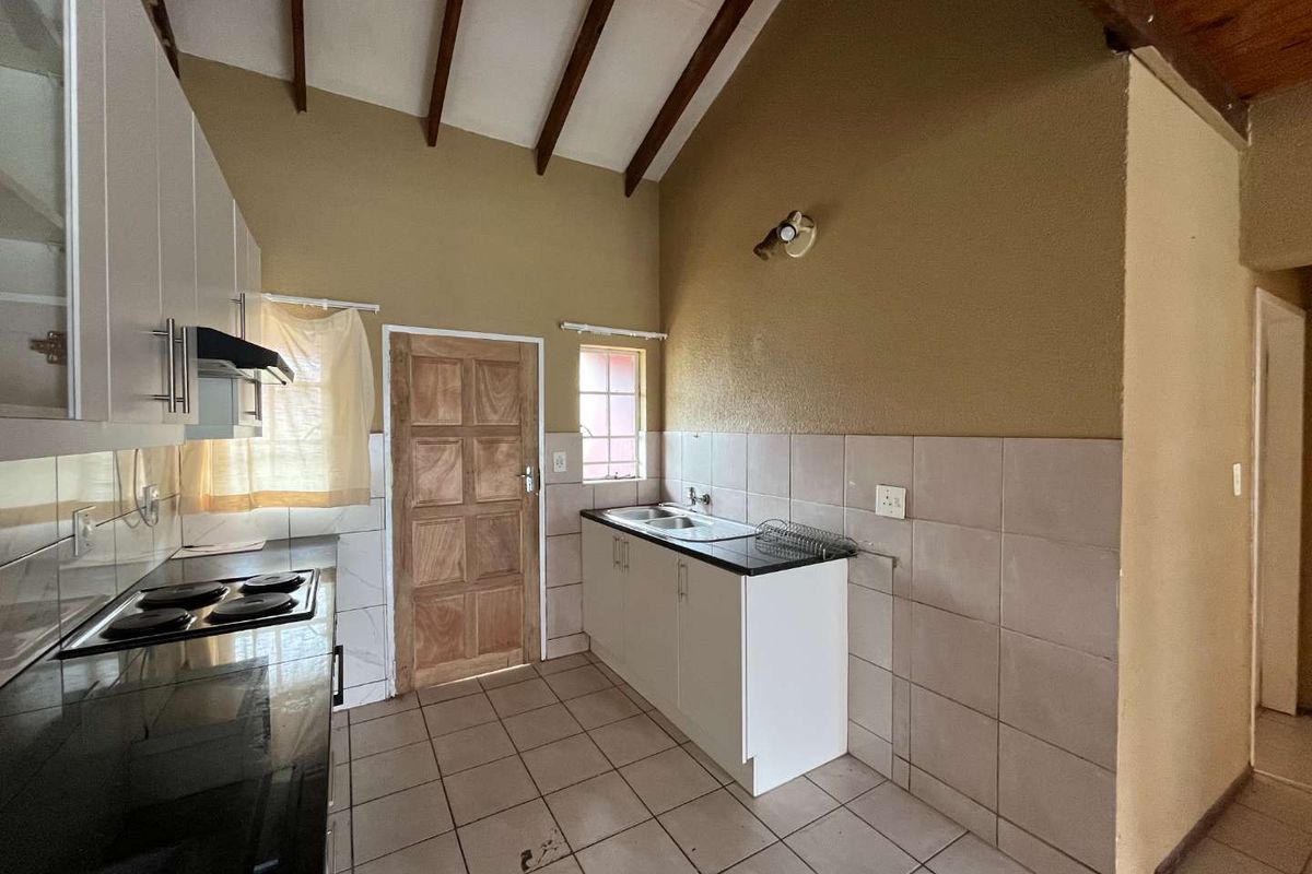 Newly Renovated 2 Bedroom Sectional Title Unit with Mezzanine - Photo 4