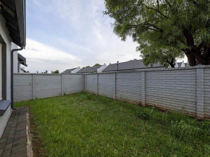 SECURE LIVING WITH POTENTIAL: 2-BEDROOM HOME WITH CHARM - Photo 7