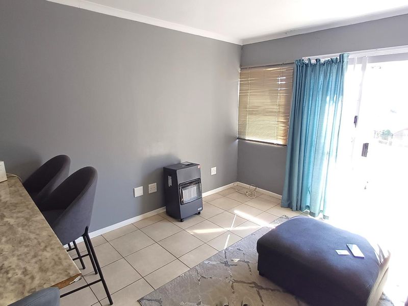 Top floor 2 bedroom apartment in a standalone building within Silverstream - Photo 3