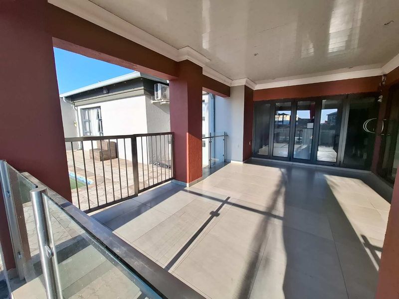 Spacious Double-Storey Family Home with Pool and Solar Power - Photo 9