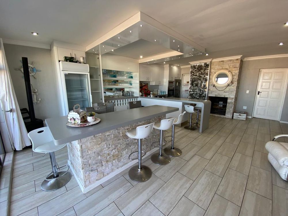 First floor open-plan lounge, kitchen and lounge with balcony