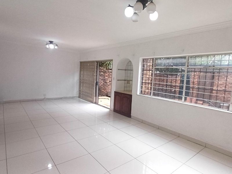 Spacious, Affordable Double-Storey Living with Patio & Pool - Photo 8