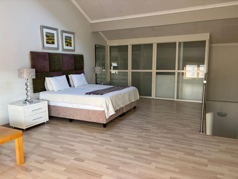A STUNNING ONE BEDROOM FURNISHED DUPLEX - Photo 9